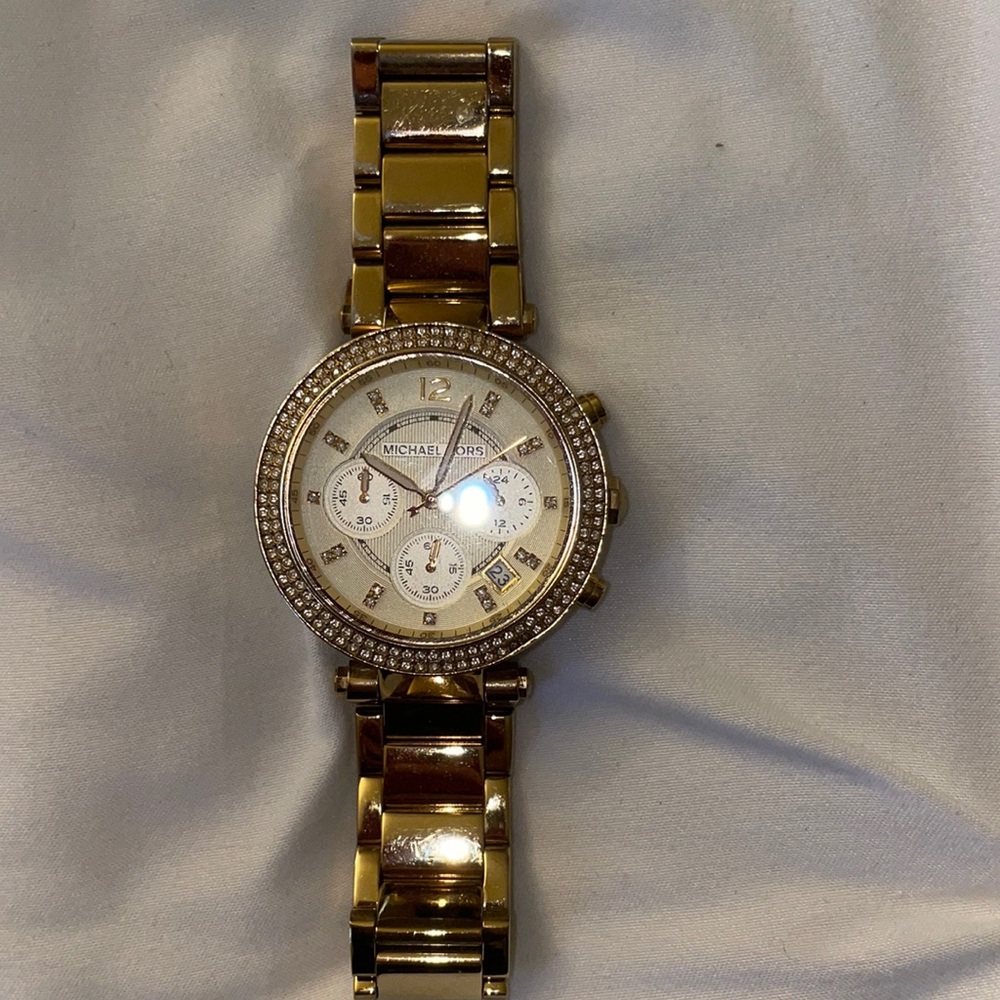 Michael Korka gold watch